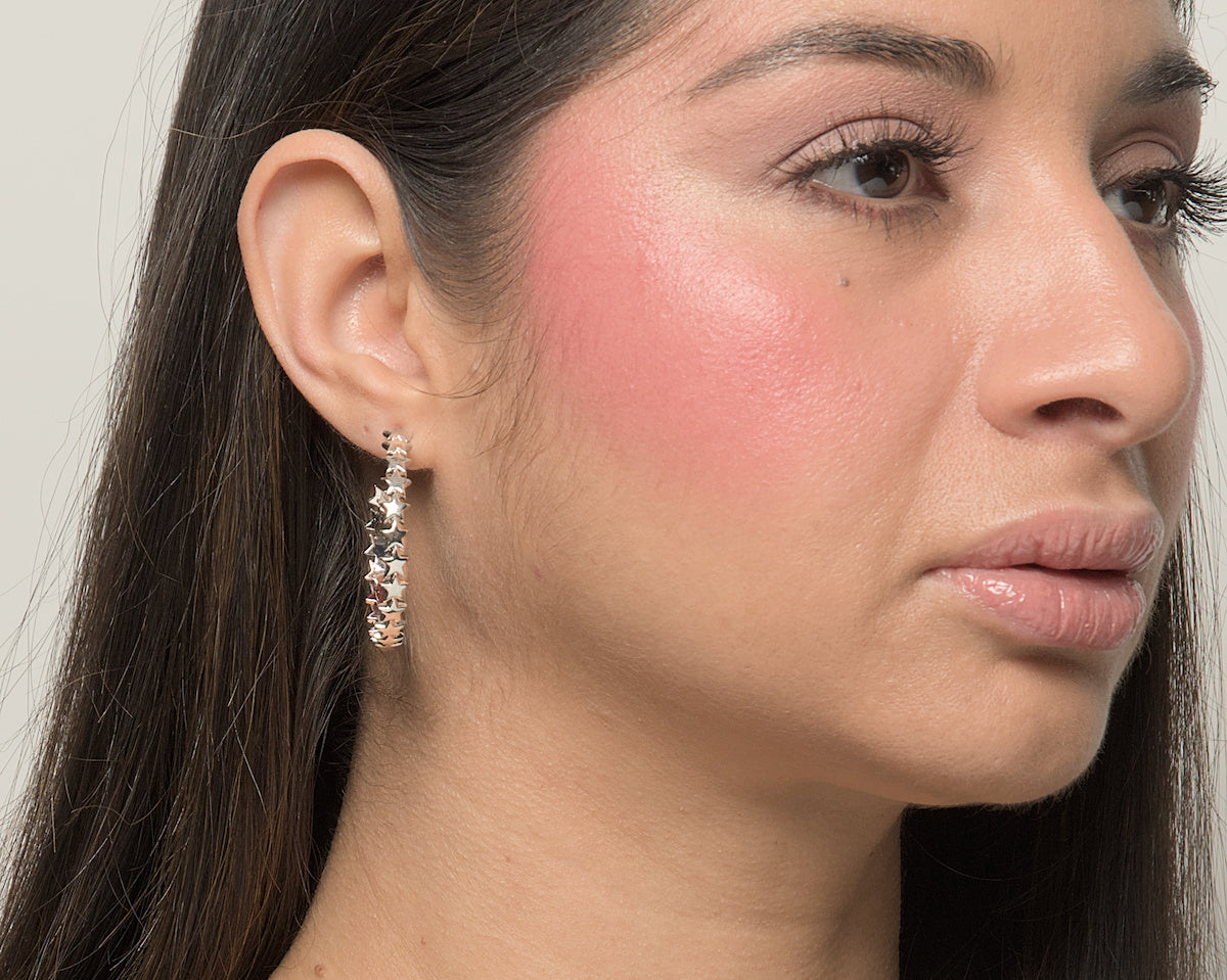 Baby Bri hoop earrings by coco + peach jewelry worn by a Latina model