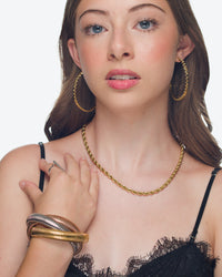Bri star hoop earrings by coco + peach jewelry worn on a Latina model