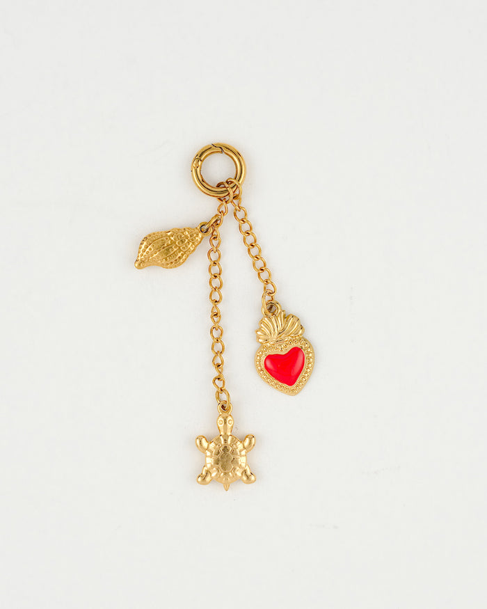 Gold waterproof bikini charm for jewelry by coco + peach in Chicago