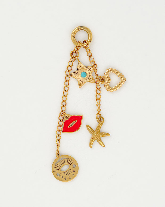 Gold Playa Babe bikini charm close up from coco + peach jewelry in Chicago 