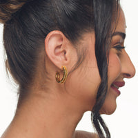 Marie midi hoop earrings by coco + peach jewelry worn by a Latina model