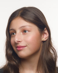Isabella taco earrings worn by a Latina tween model