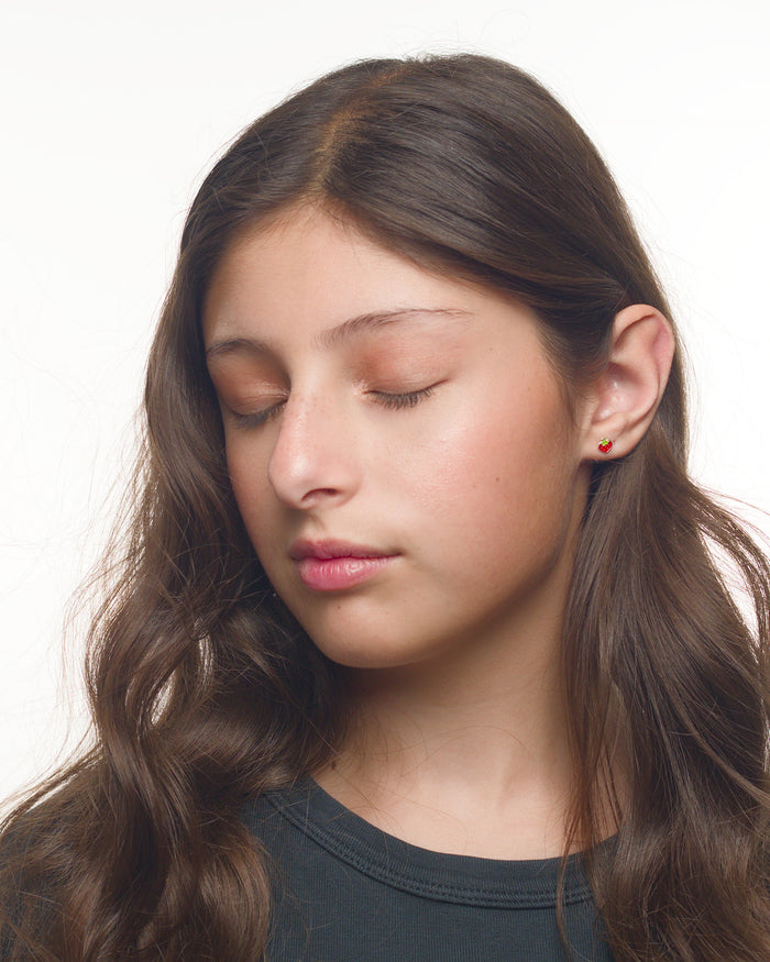 Maia strawberry earrings worn by a Latina model