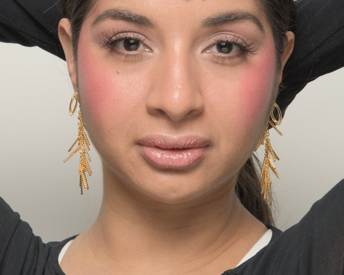 Melissa convertible earrings by coco + peach jewelry worn by a Latina model