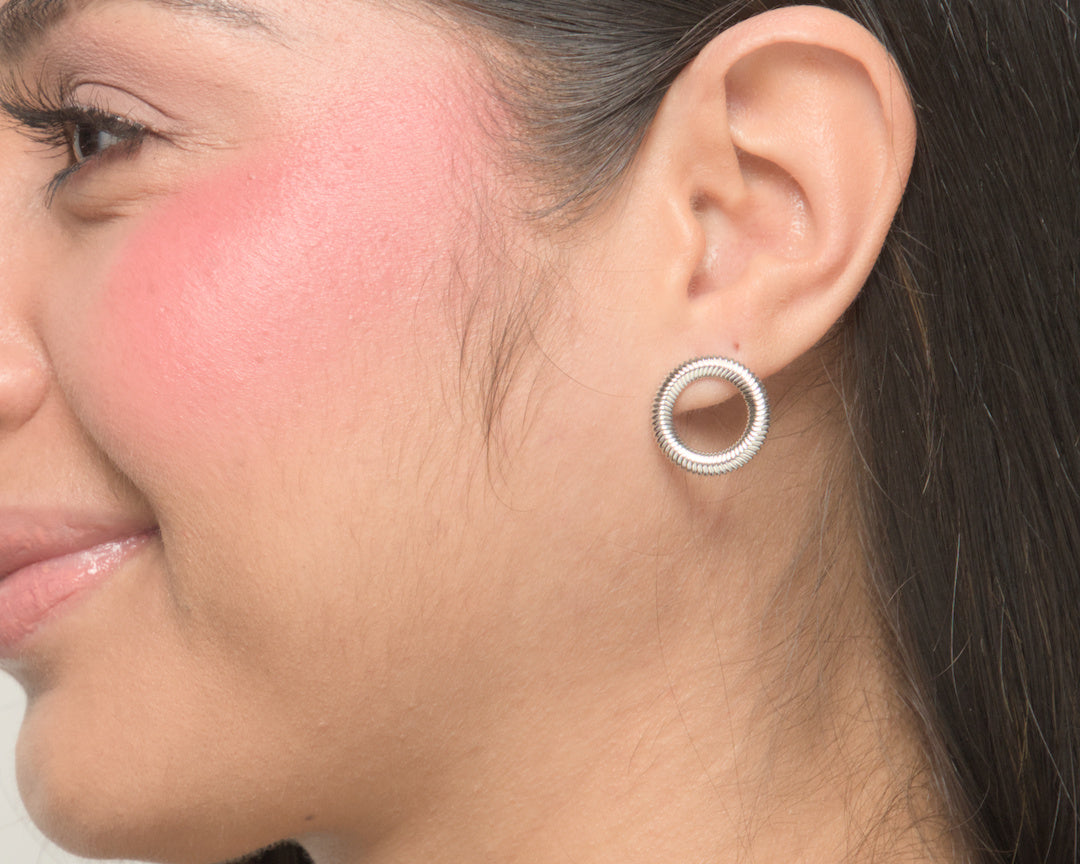 Melissa convertible earrings by coco + peach jewelry worn by a Latina model