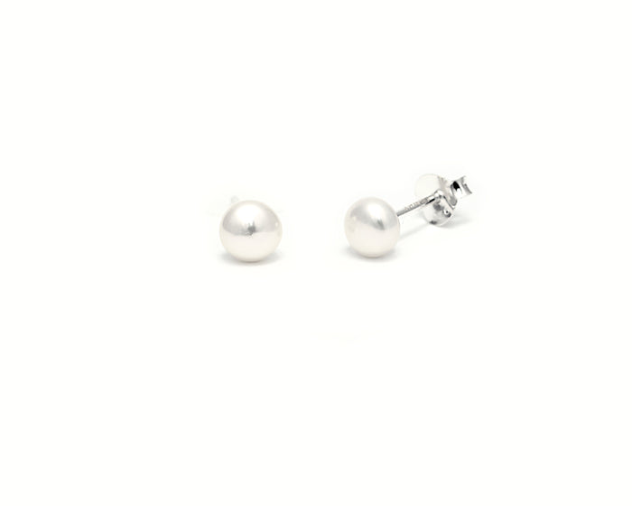 Nelly pearl earrings up close product photo
