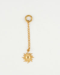 gold bikini charm with sunshine charm close up from the Playa Babe collection