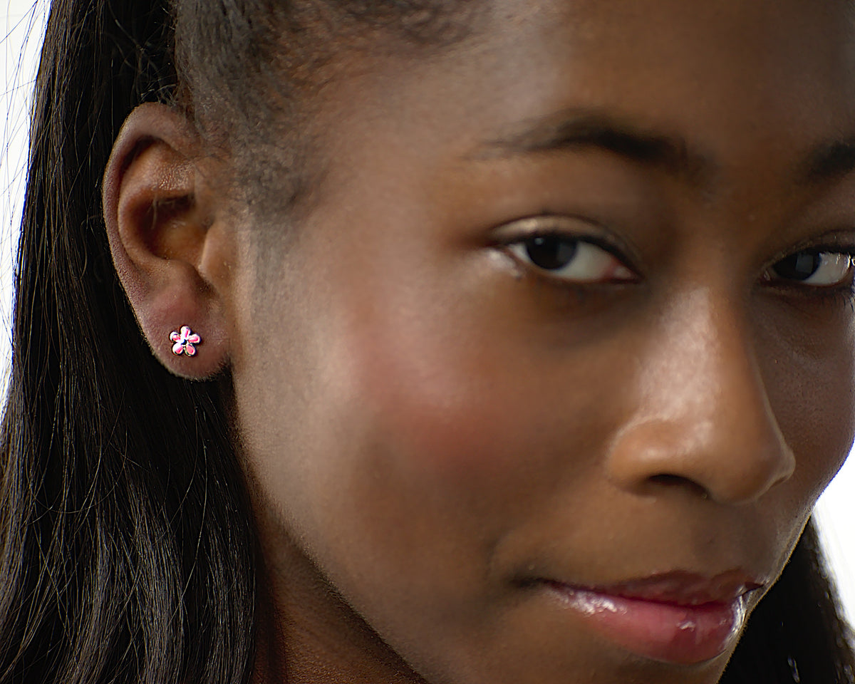 Arabella flower earrings worn by a Latina tween model