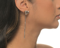 Blake convertible earrings by coco + peach jewelry worn on a Latina model.