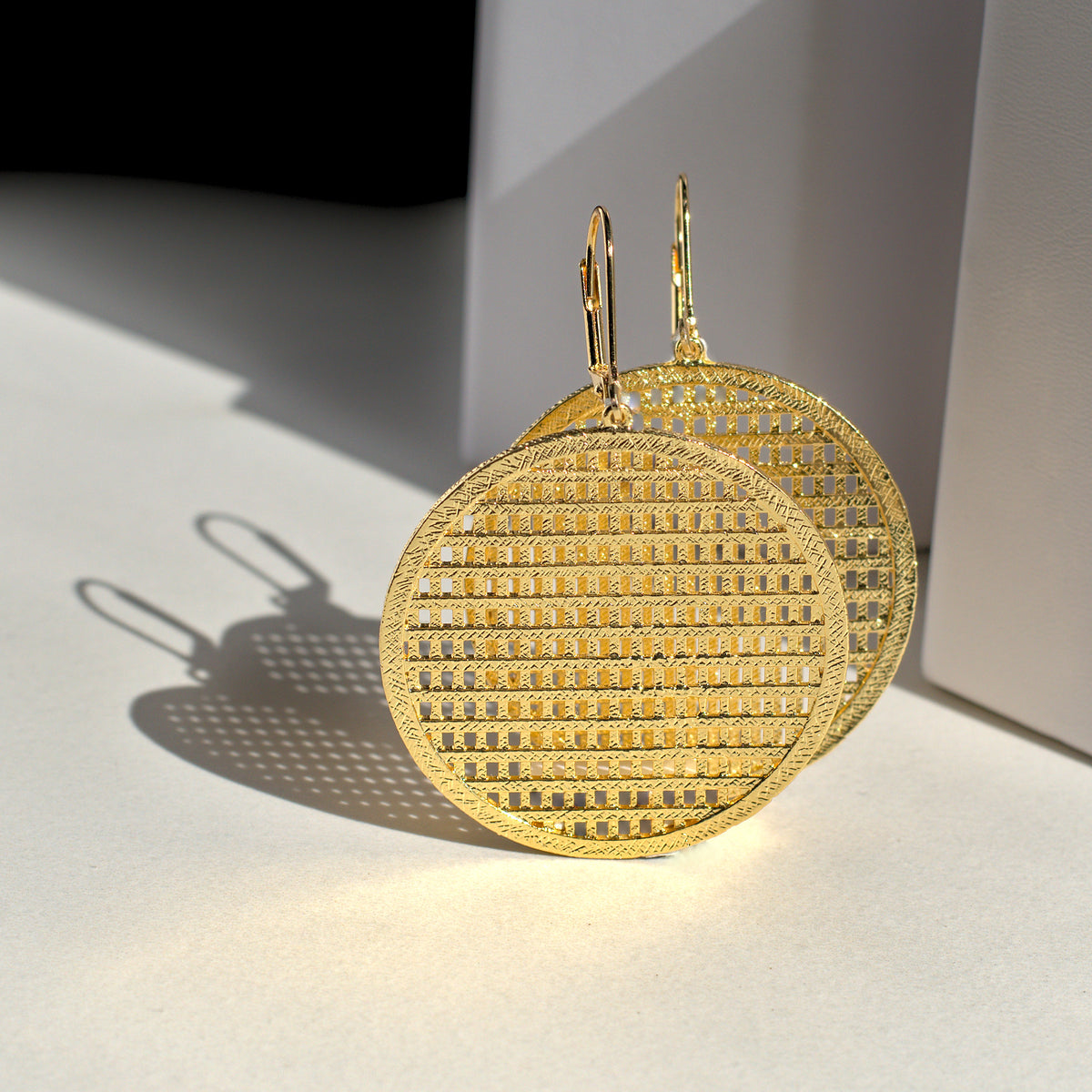 Carolina disc earrings classic everyday jewelry by coco + peach jewelry up close product photo