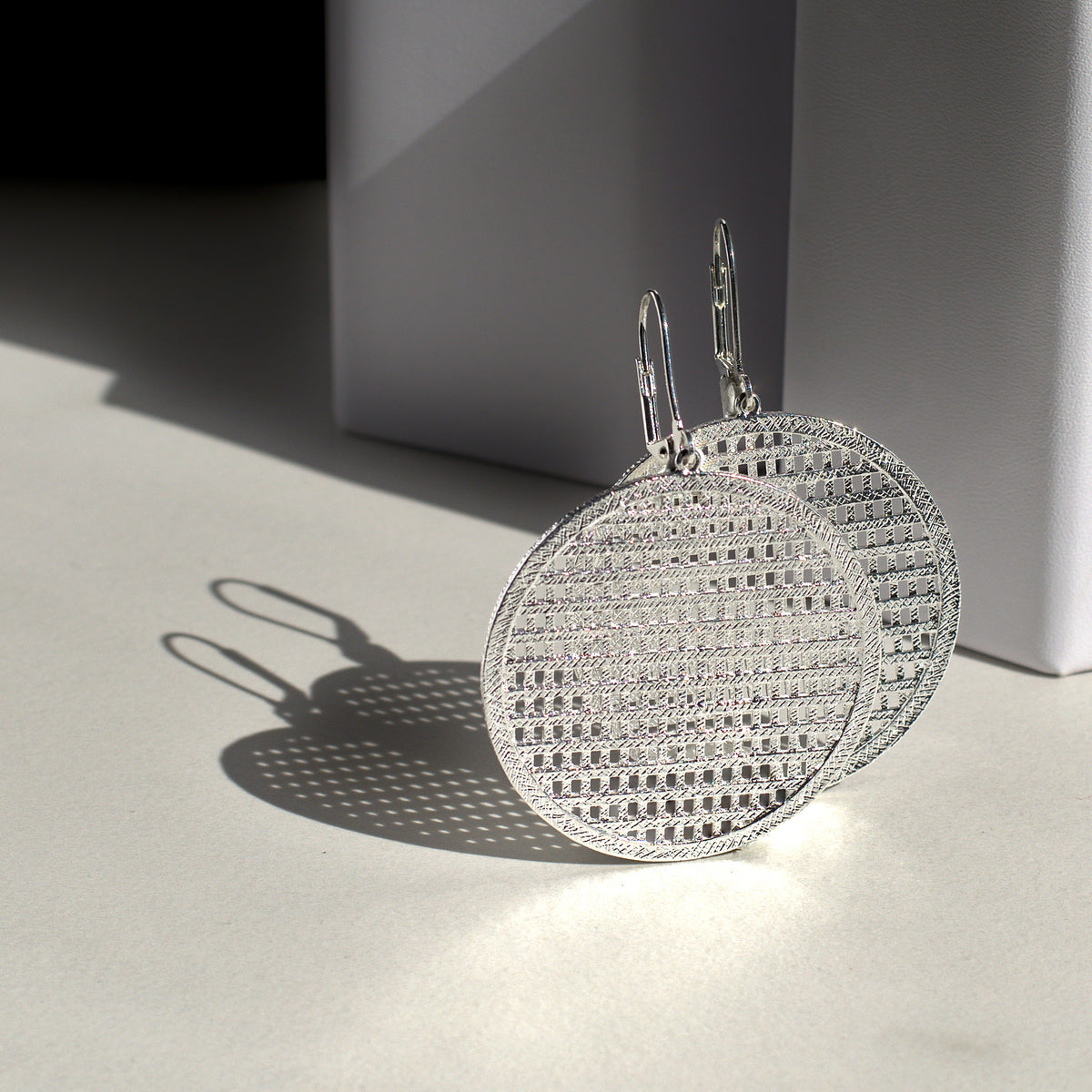 Carolina disc earrings classic everyday jewelry by coco + peach jewelry up close product photo