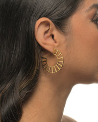 Michelle fan earrings by coco + peach jewelry worn by a Latina model