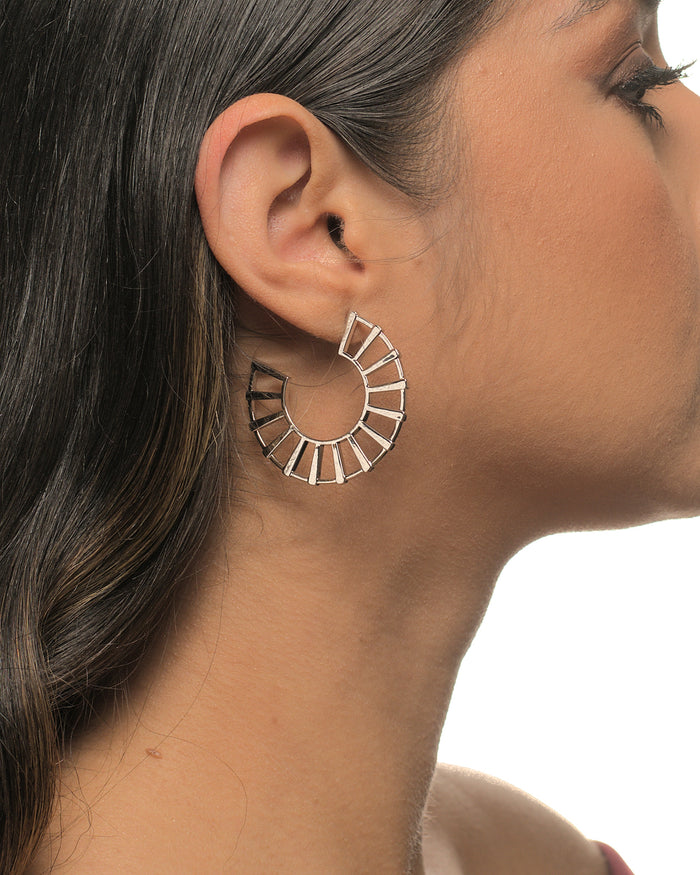 Michelle fan earrings by coco + peach jewelry worn by a Latina model