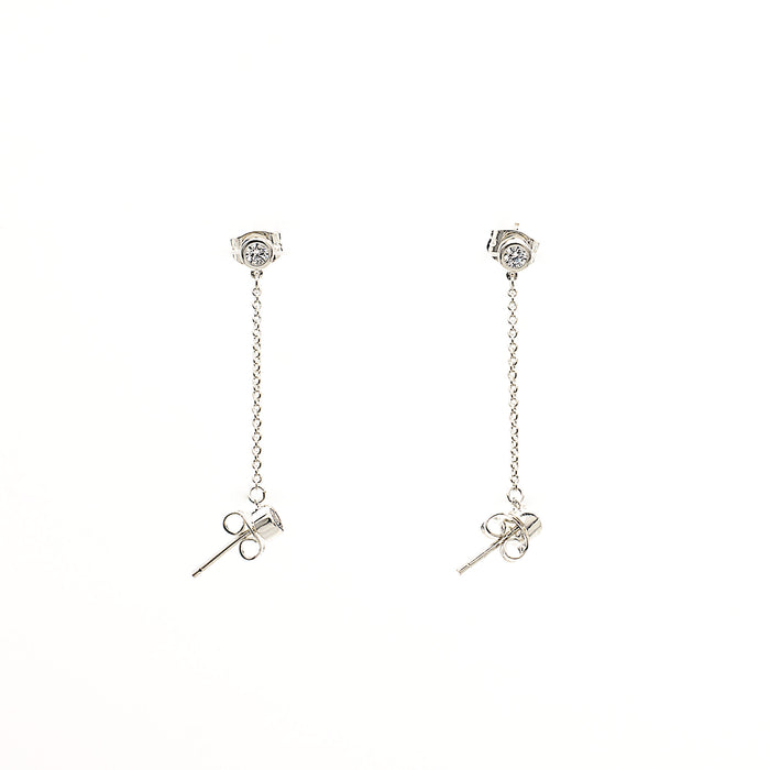 edgy and modern two stud cubic zirconia earring with chain